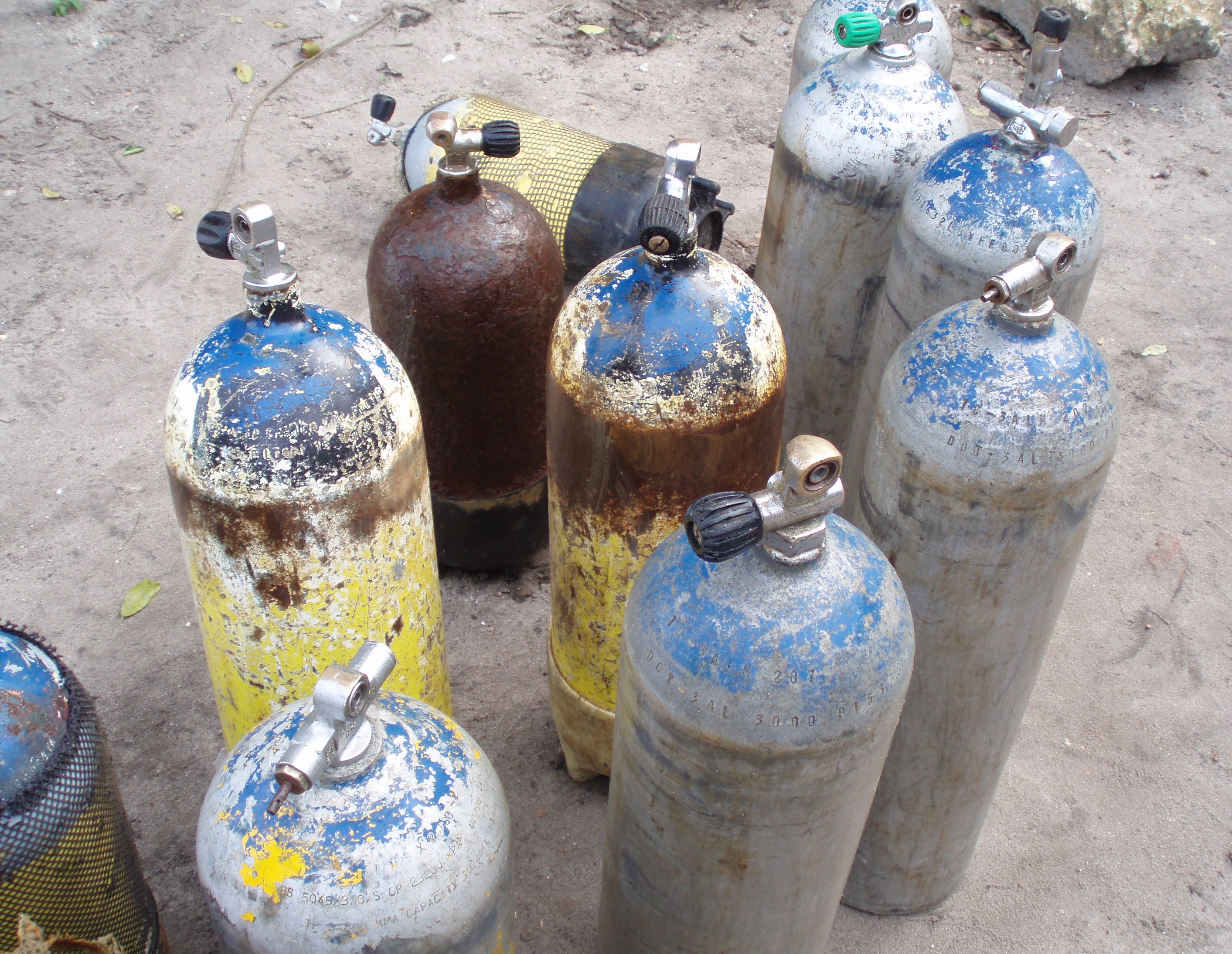 Scuba cylinders used by the Mkokotoni divers, photographed on shore between dives, Mkokotoni, Zanzibar 2006